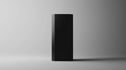 Poster - A Black Hexagonal Prism Stands on a White Background