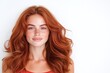 © Elysian Essence - Portrait of young woman with long wavy red hair, smiling expression, isolated on white background, natural beauty, minimalistic studio style, cheerful and vibrant look