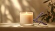 © Orod - candle in a frosted glass container, glowing with a calming ambiance, surrounded by lavender sprigs