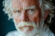 © Andrii Savchuk - Portrait of an elderly man with a white beard and blue eyes