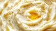 © SepazWorks - Plate of creamy mashed potatoes with butter swirl.