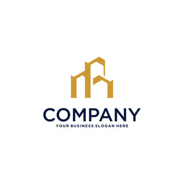 real estate logo design with house and building