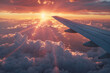 © Tipapat - Airplane Wing Over Clouds at Sunsets