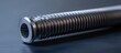 © AImmersive Imagery - Close-up view of a metallic threaded rod with deep grooves and a cylindrical shape on a dark background with Copy Space