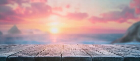 Poster - Sunset over ocean with wooden table in foreground and soft clouds in sky Copy Space