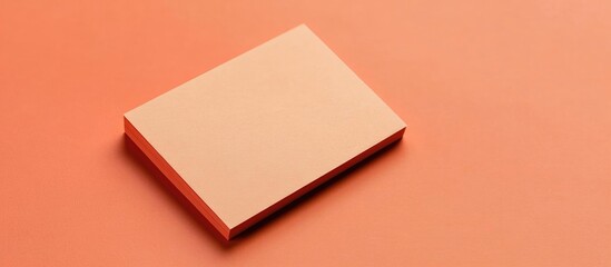 Poster - Blank beige notebook on coral background with copy space for text or graphics