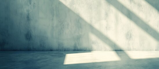 Poster - Minimalistic interior space with concrete wall and floor, soft shadows and light creating patterns, Copy Space available for text placement.