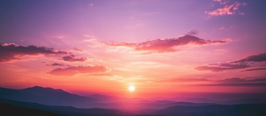 Poster - Vibrant Sunset Over Mountain Range with Colorful Sky and Cloud Formation