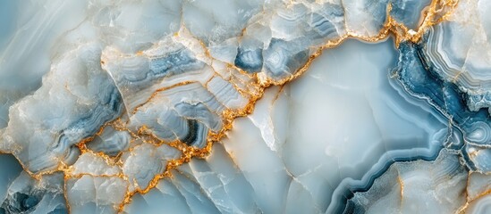 Poster - Elegant blue agate texture with shimmering gold veins creating a luxurious natural mineral background for design and advertising purposes.