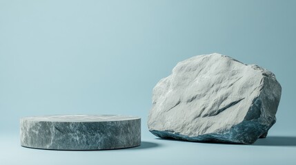 Poster - Minimalist studio setting featuring two empty rock podiums against a light blue backdrop ideal for product display or artistic presentations.