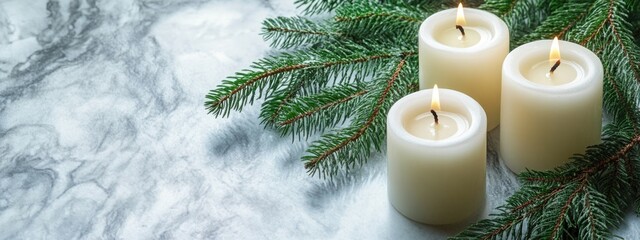 Poster - Serene white candles adorned with fir branches on an elegant marble background featuring ample copy space for text and designs.