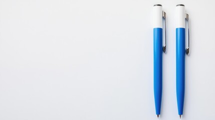 Leinwandbilder - Two corporate blue and white pens positioned on a clean white background, featuring logo space for branding or personalization.