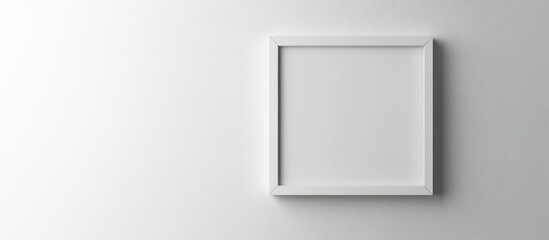 Poster - Minimalist white office wall with empty picture frame template for custom text or graphic design placement.