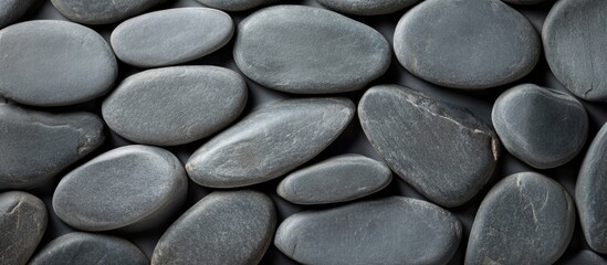 Aufkleber - Grey smooth river stones background with various shapes and sizes, natural texture, suitable for design purposes, Copy Space