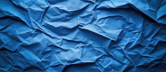 Aufkleber - Crumpled blue paper texture background with uneven folds and shadows ideal for design applications Copy Space