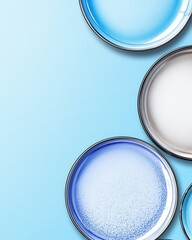 Wall Mural - colorful circular plates on blue background for food presentation
