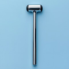 Poster - Reflex hammer isolated on a minimalist background its rubber head and metallic handle showing the simplicity and utility of neurological exams