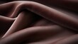 © Nice Seven - Mesmerizing Macro Close-Up Shot of Soft, Smooth Fabric with Elegant Curves and Textures Capturing Light and Shadows in Rich Brown Tones
