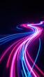 © Vancouver - Neon light trails on a dark background highlighting vibrant pink and blue streaks