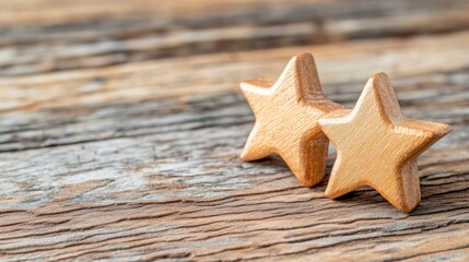 Poster - Two Wooden Star Decorations on Rustic Wooden Background for Holiday or Celebration