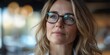 © Elena - Professional Businesswoman in Glasses