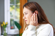 © dragonstock - Young woman with ear pain