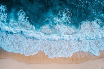 Aufkleber - Waves crashing onto a sandy beach under bright sunlight in a coastal paradise