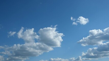 Wall Mural - white clouds and blue sky .time lapse