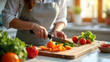 © Anastasia - A woman prepares fresh vegetables and fruits on a wooden cutting board in a bright kitchen, showcasing a healthy lifestyle and cooking skills