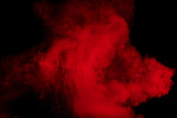 Wall Mural - red cloud of powdery dust is blowing in the wind.