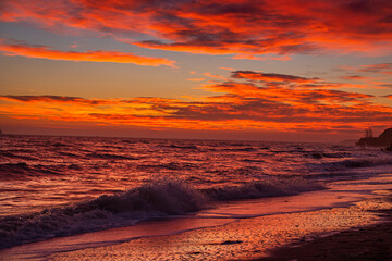 Wall Mural - Seashore with clouds at sunset in summer	
