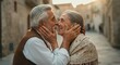 © gn8 - Elderly caucasian couple embracing tenderly in historic european village