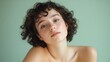 © Chotijah - Young Woman With Curly Hair And Bare Shoulders