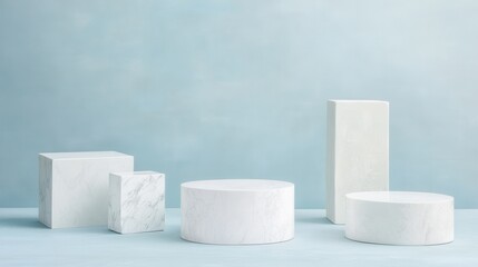 Poster - Minimalist Display of White Geometric Shapes on Soft Blue Background