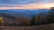Majestic Mountain Range at Sunset with Autumn Hues