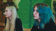 © Довидович Михаил - Two attentive high school girls listening to a lecture in a classroom, demonstrating engagement and focus in their education