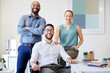 © peopleimages.com - Happy, office and portrait of business people at startup for company pride, opportunity or career. Professional, creative agency and men and woman with smile for diversity, teamwork or collaboration
