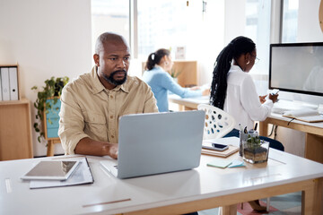 Poster - Businessman, research or accountant on laptop for news, investment info or budget plan for profit. Coworking, online update or financial advisor reading on technology for network or accounting report