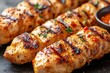 © Husien - Grilled chicken skewers, herbs, sauce, dark background, food photography