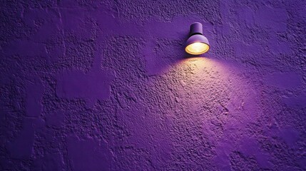 Poster - Illuminated wall sconce casting warm light on a textured purple wall.