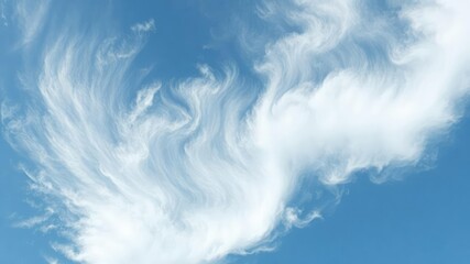 Abstract swirls of white clouds against a blue sky, air, sky, tranquil