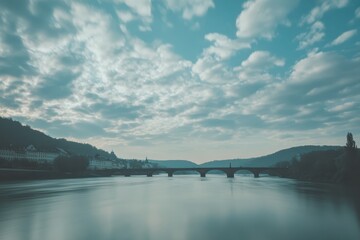 Poster - Timelapse of calm river reflecting clouds near historic bridge during twilight hours, Time-lapse of river near the old bridge and clouds flowing in the sky in Heidelberg, Germany