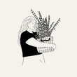 © Vallie Wolf - girl holding a pot with a suculent plant with a smile