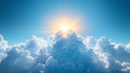 Wall Mural - Sunlit Clouds Rising Above a Vast Blue Sky with Brilliant Radiance Shining Through Their Apex.
