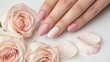 © Olga - Soft pink nails with roses and pastel background
