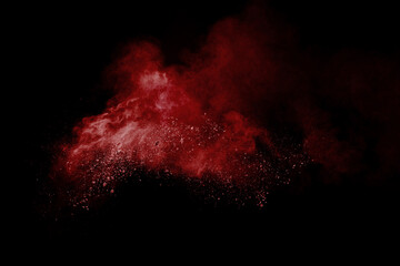 Wall Mural - red cloud of powdery dust is floating in the air. the image has a moody and mysterious feel to it.