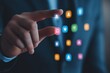 © Sergio - Business professional interacting with colorful digital icons representing technology and connectivity