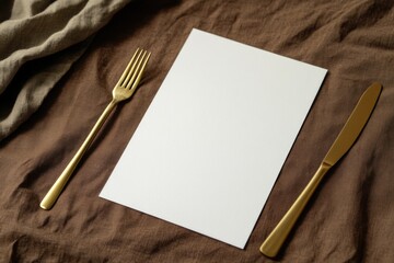 Aufkleber - A fork, knife, and a piece of paper on a table