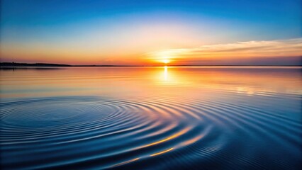 Poster - A lone ripple disturbs the tranquil surface of a calm lake, reflecting the fiery hues of a breathtaking sunset.