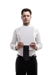 Fototapete - Man dressed in a white shirt and tie holding a blank paper sheet, isolated on a white background. Concept of presentation or template design